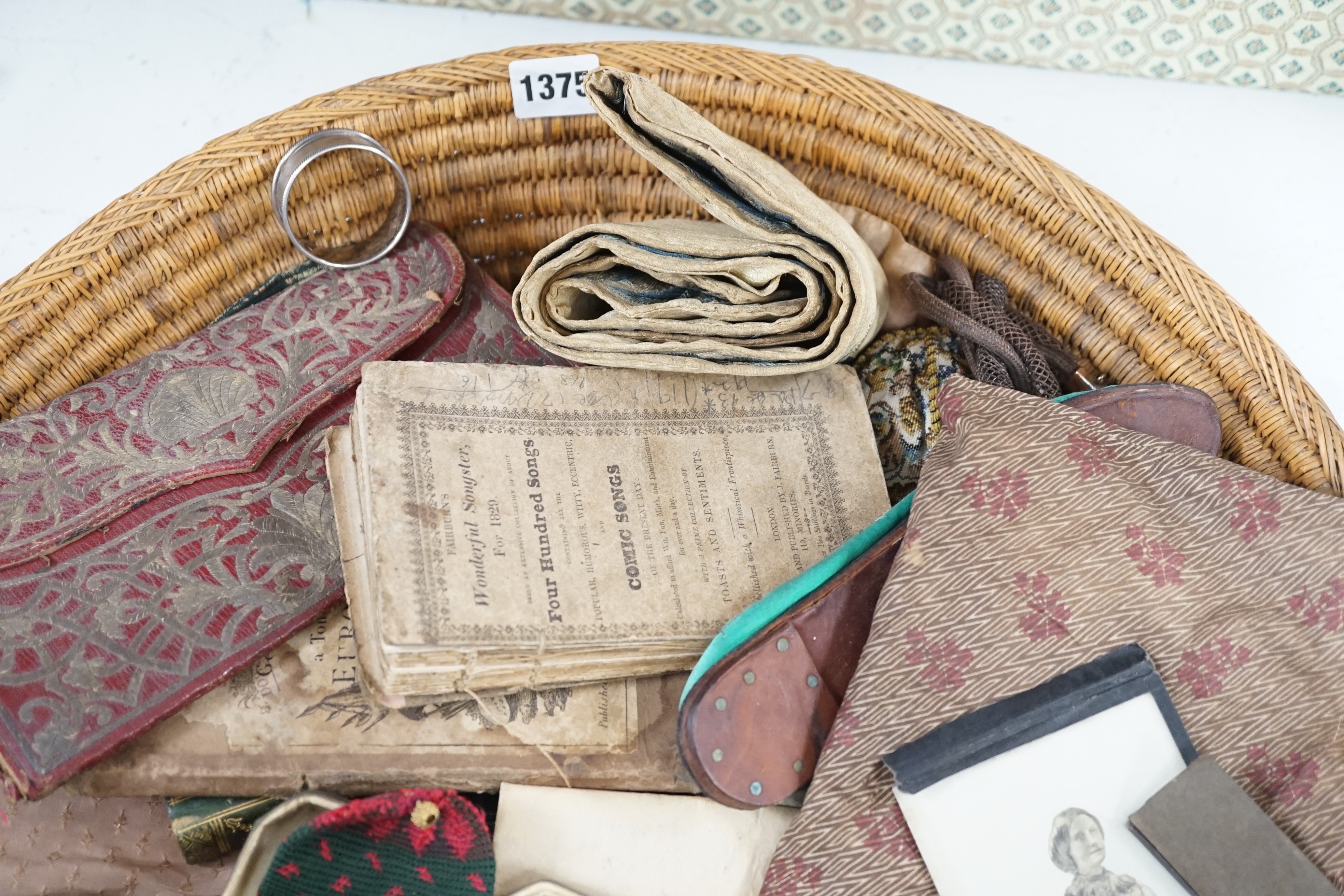 A collection of assorted curios, to include a red leather purse inscribed ‘Constantinople 1752’